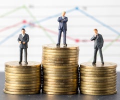Miniature model group of businessman standing on coin, business