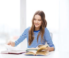 education and home concept - happy smiling student girl with books
