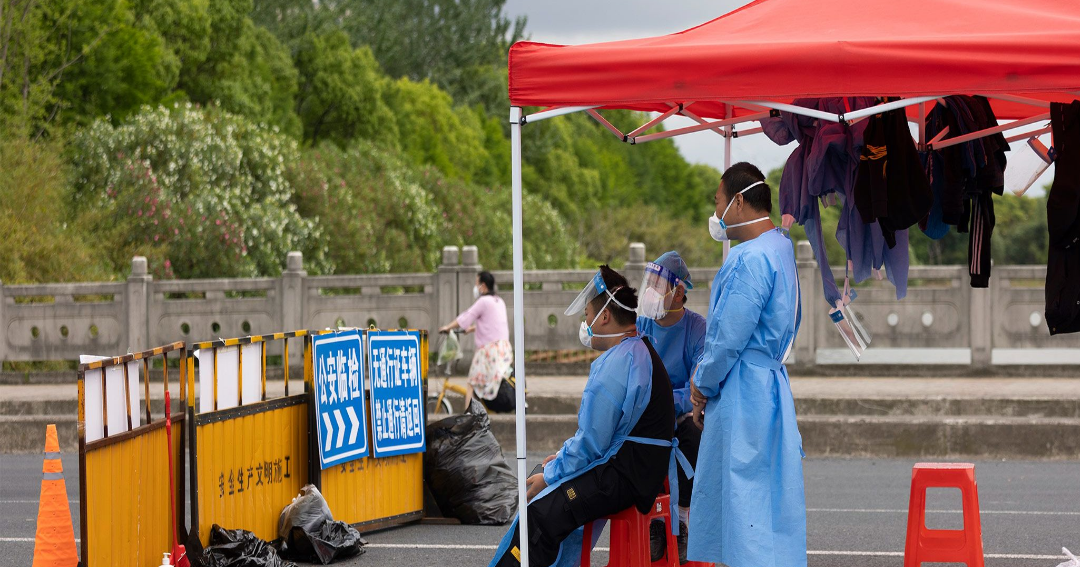 Shanghai covid enforcers maintain lockdowns even as cases decline