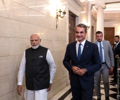 Narendra Modi, India's prime minister, left, leaves a news conference with Kyriakos Mitsotakis, Greece's prime minister, in Athens, Greece, on Friday, Aug. 25, 2023. Modi arrived in Greece on Friday for talks to strengthen bilateral ties. Photographer: Yorgos Karahalis/Bloomberg