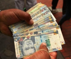 Soles, moneda local de Perú