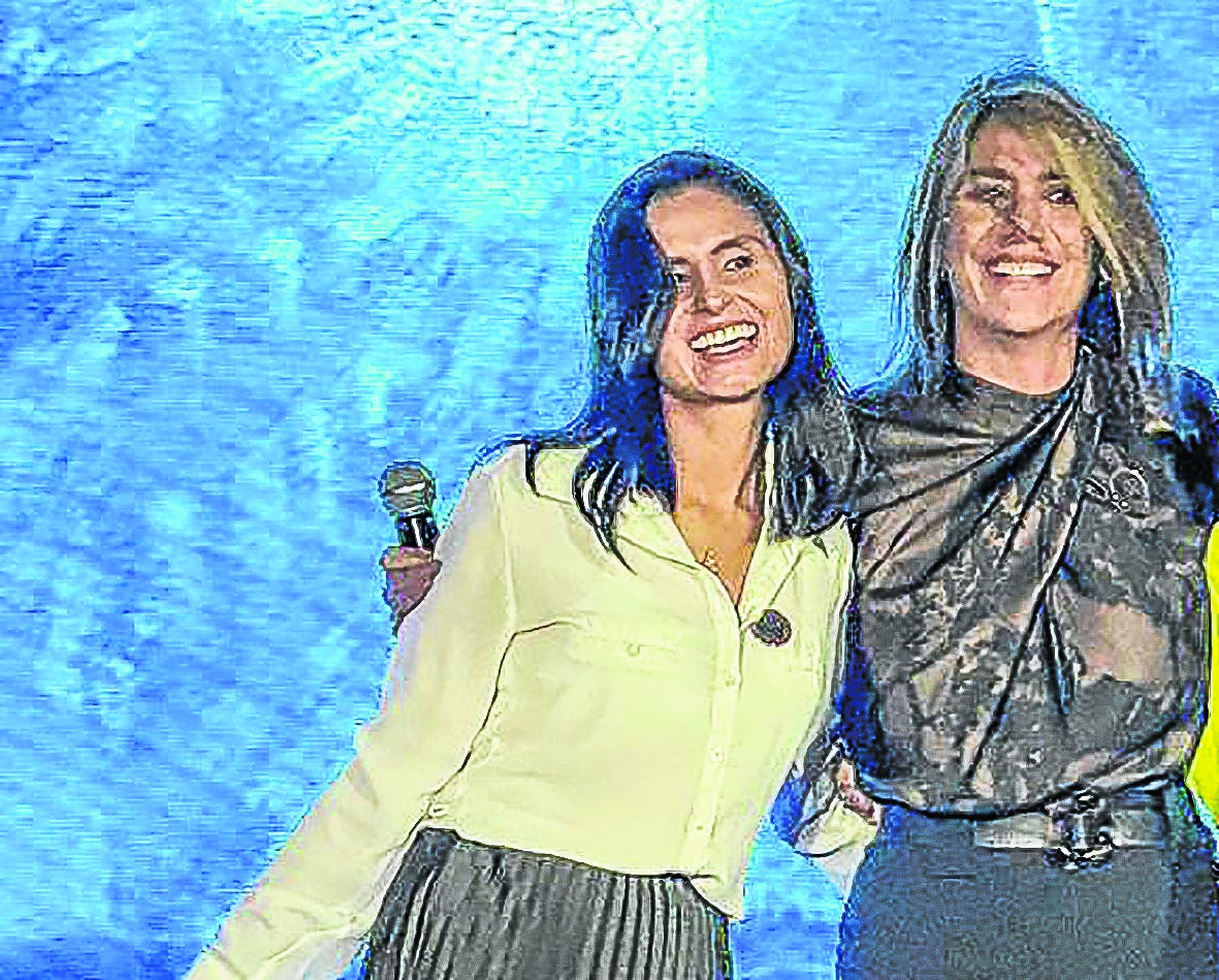 Flor Tolosa, directora comercial en Olimpia IT; y Ana Karina Quessep, presidente BPro.