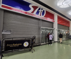 Super Almacén Olímpica cerrado por la Dian