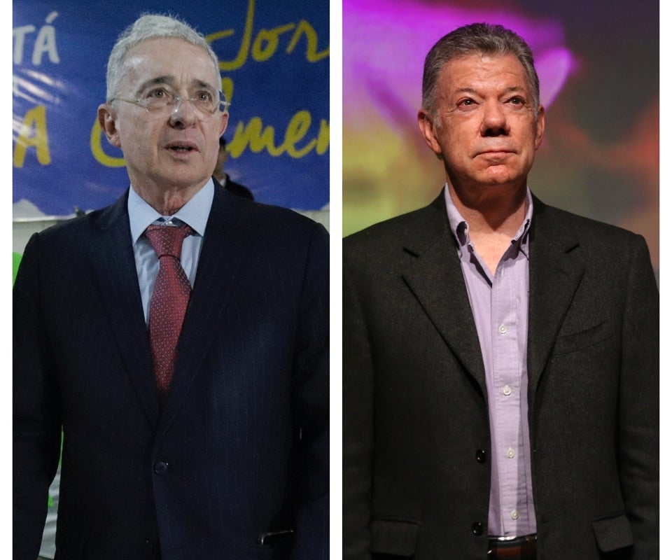 Los expresidentes de Colombia Álvaro Uribe Vélez y Juan Manuel Santos