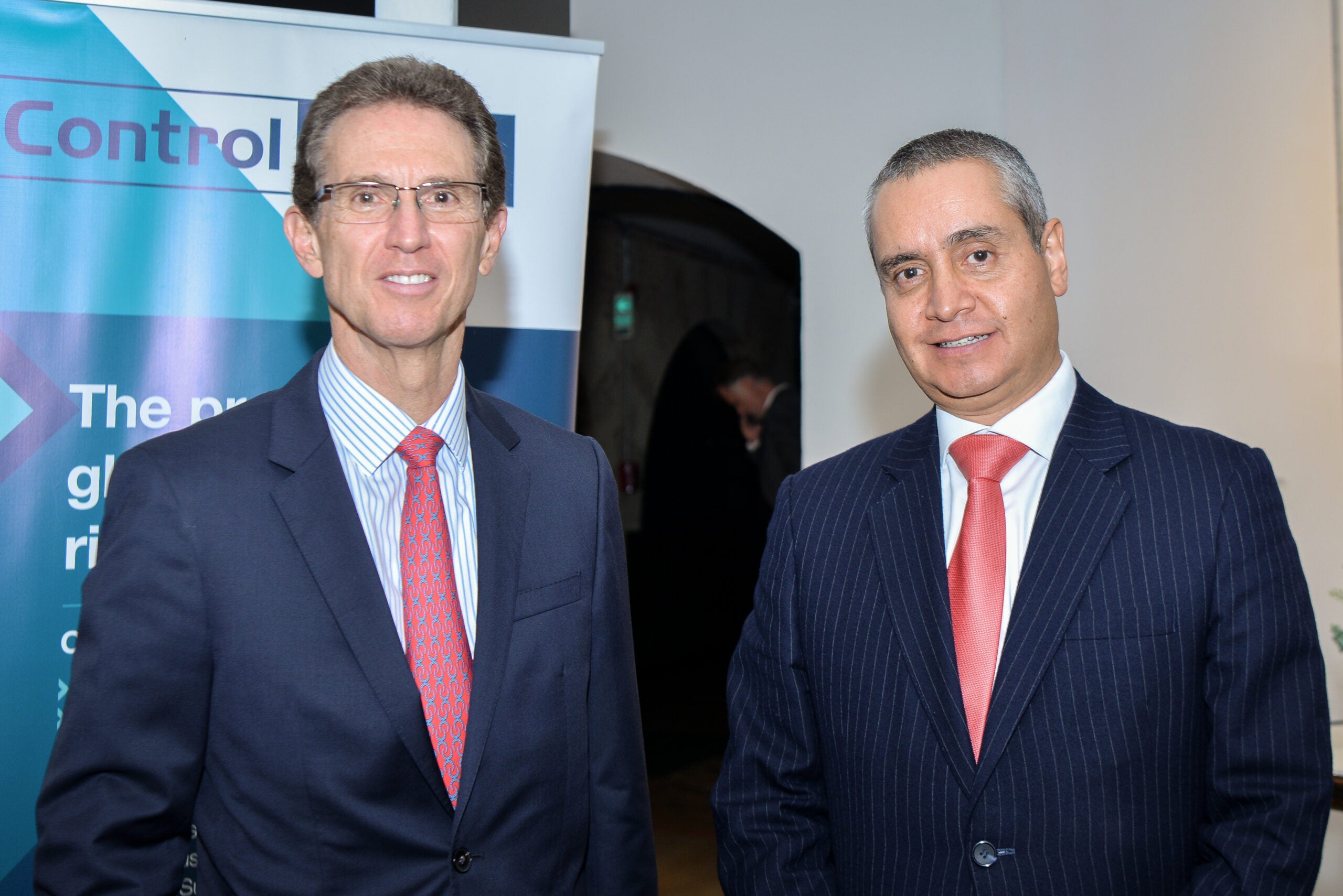 Federico Echeverri, presidente de AES, y Julián Torrado, managing director de Cibc.