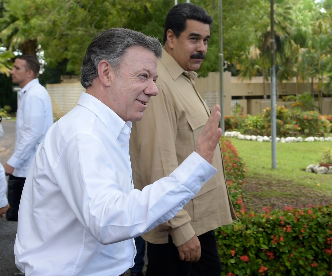 Juan Manuel Santos, expresidente de Colombia y Nicolás Maduro, presidente de Venezuela