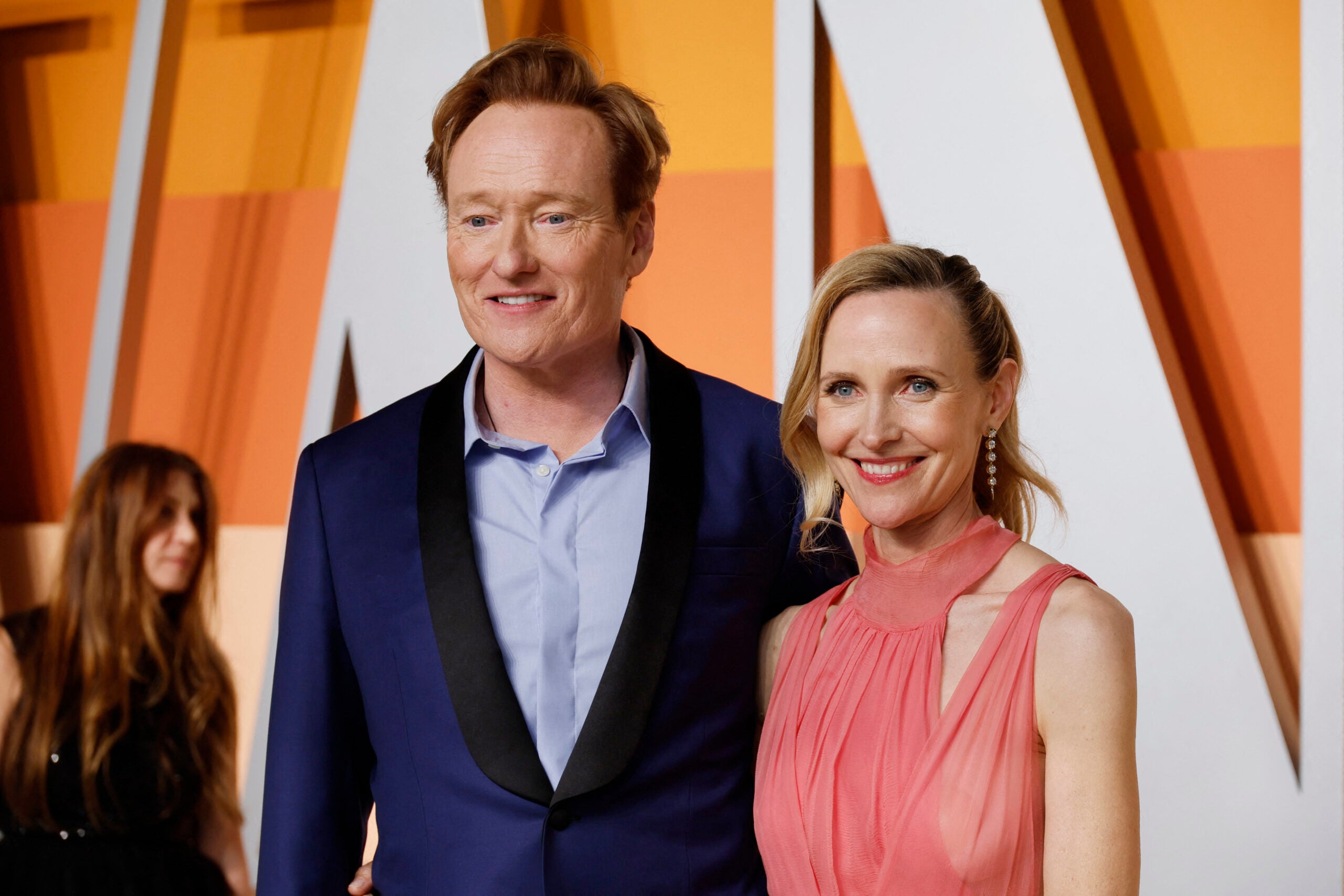 Conan O’Brien, presentador y comediante; y Liza Powel O’Brien, redactora publicitaria.