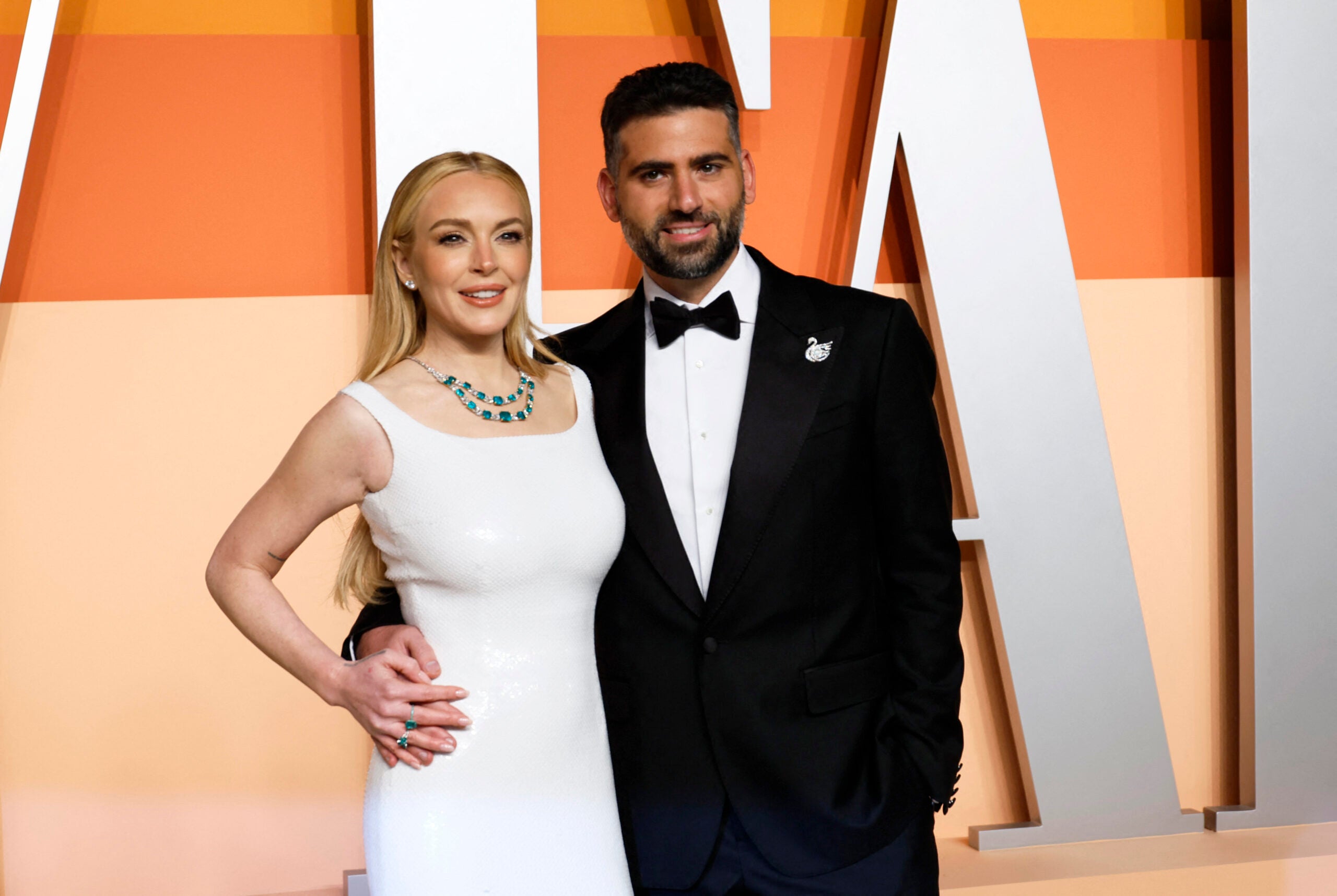 Lindsay Lohan, actriz y cantante; y Bader Shammas, vicepresidente adjunto en Credit Suisse.