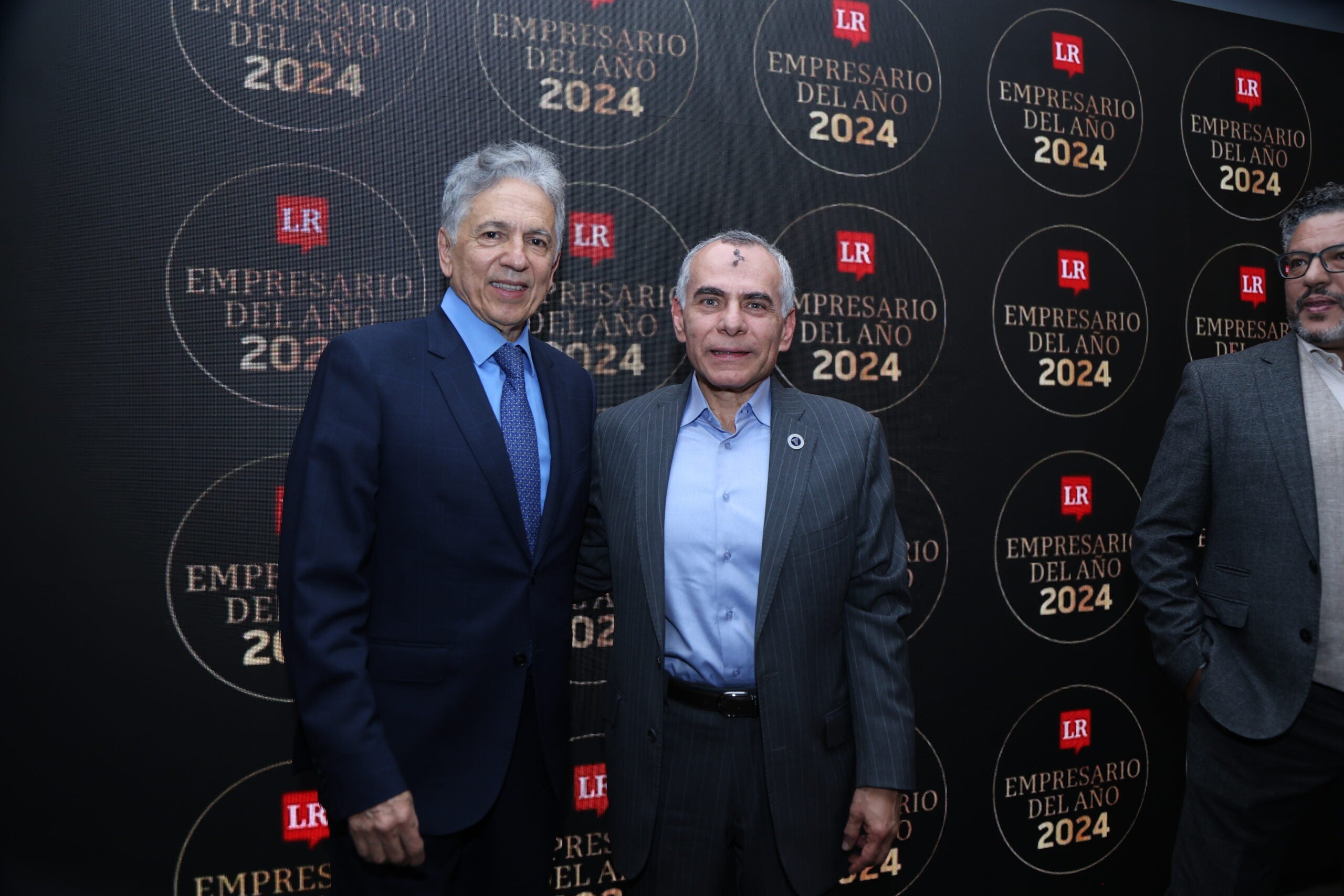 Carlos Iván Vargas, inversionista de Dibanka; y Álvaro Vélez Millán, presidente de Seguros Aurora.