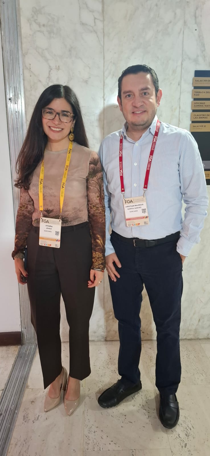 Viviana Araque Mendoza, presidente ejecutivade Bancamía; y Christian Quiroga, gerente de Comunicaciones deBancamía.