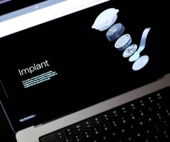 The Neuralink device on the website.