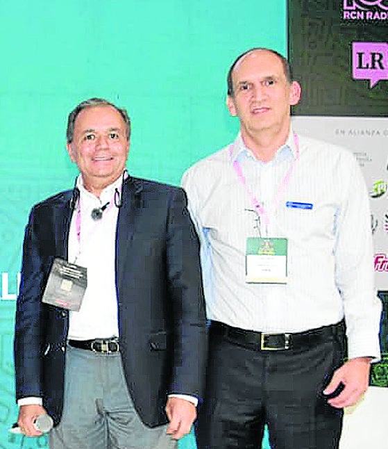 Francisco Muñoz, presidente de Colgate- Palmolive; y Juan Carlos Henao, gerente general de Harinera del Valle.