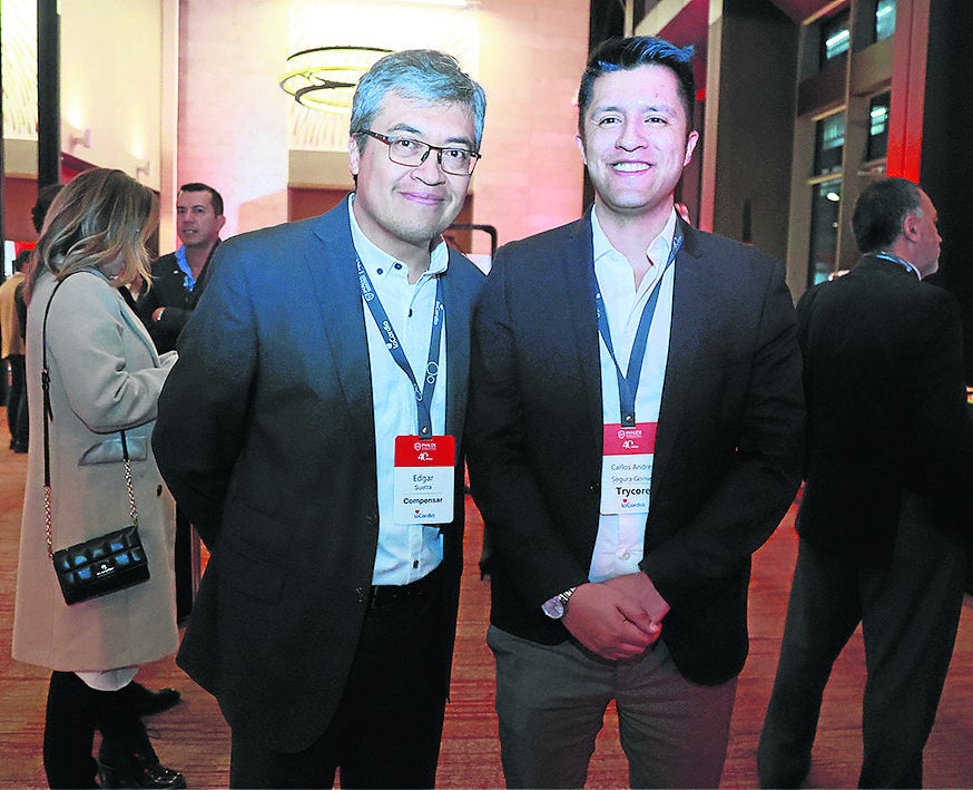 Édgar Suelta, analista en Compensar; y Carlos Segura, director de Trycore, durante el evento.