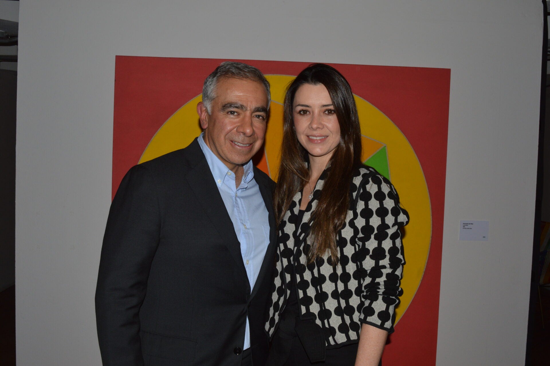 Carlos Enrique Angulo; y Diana Ayala, clientes de Davivienda, durante el evento.